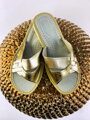 Dámské kožené papuče zlaté proplétané